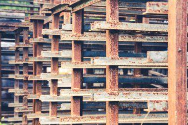 Abstract pattern of corroded metal angled bars