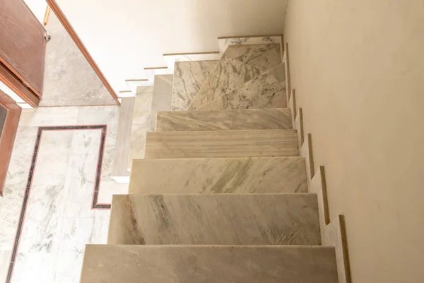 Marble stone stairway to the house terrace