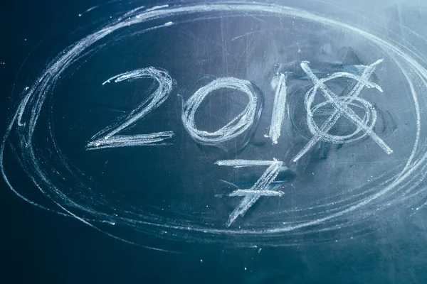 2016 crossed and new years 2017 on chalkboard — Stock Photo, Image