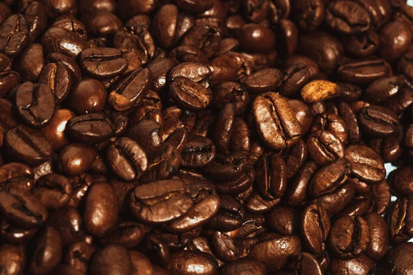Dark many roasted coffee beans texture background Royalty Free Stock Images