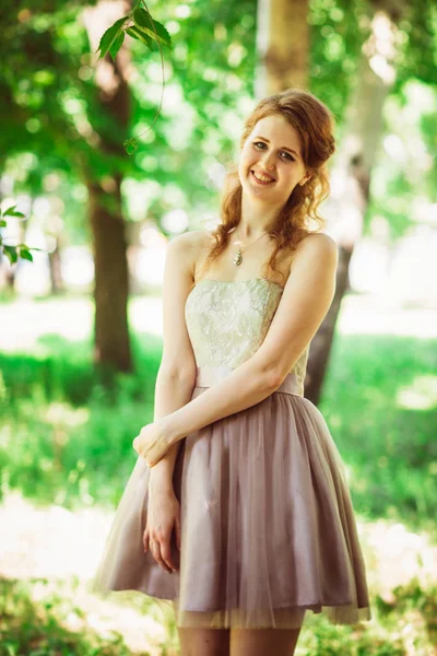 Beautiful girl on natural background — Stock Photo, Image