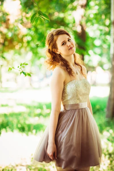 Beautiful girl on natural background — Stock Photo, Image