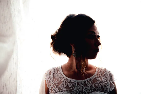 Portrait of a young bride on a light background — Stock Photo, Image