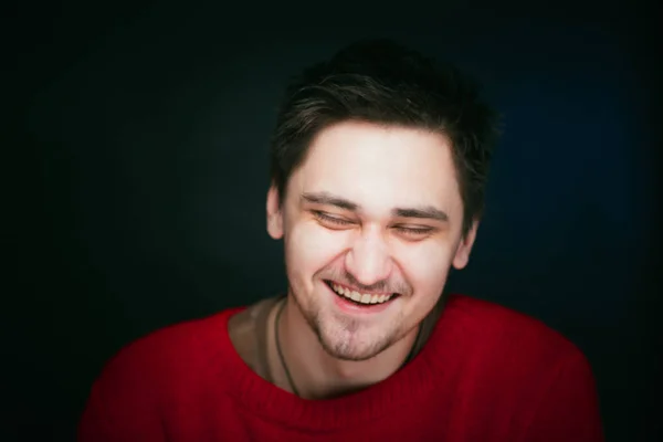 Emotional young man photo in studio — Stock Photo, Image