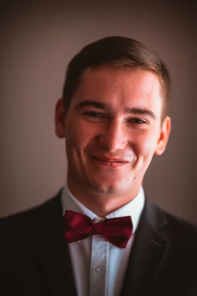 Groom in the background of the window — Stock Photo, Image