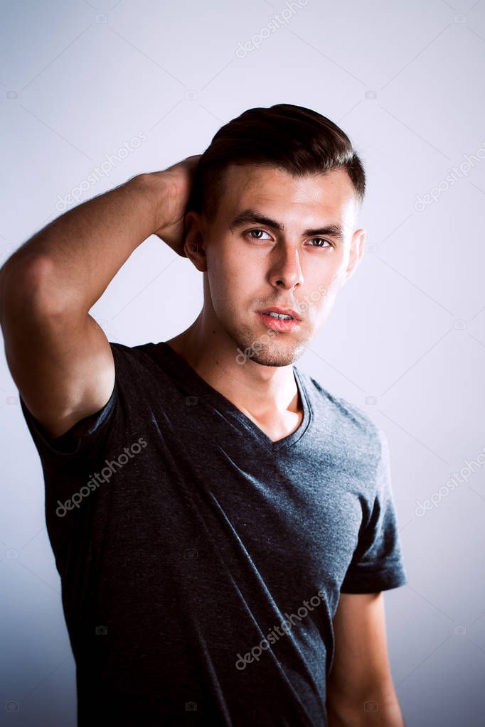 handsome young man in photo studio