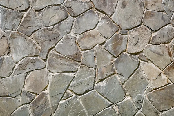 Fragment of an ancient wall from stones. (Background image) — Stock Photo, Image