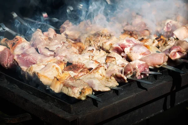 Kebab on skewers on the grill — Stock Photo, Image