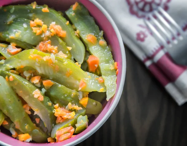 Marinated cucumbers with carrots and spices. — Stock Photo, Image