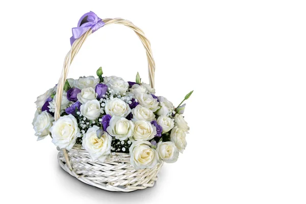 Basket with beautiful roses on a white background. — Stock Photo, Image