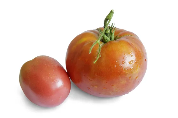 Dwie dojrzałe pomidory na białym tle. — Zdjęcie stockowe