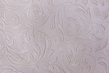Kabartmalı desenli pastel tonlarda arkaplan.