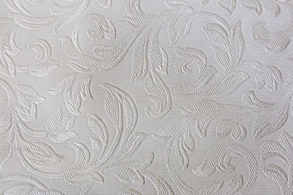 Kabartmalı desenli pastel tonlarda arkaplan.