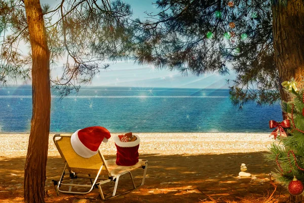 Christmas beach: a deck chair, tree and hat of Santa Claus. 3 D visualization.