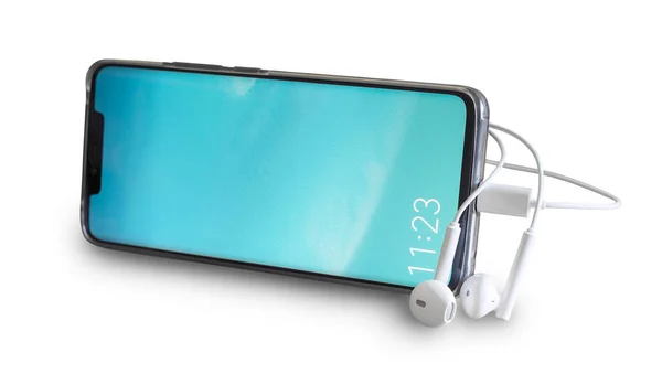 Smartphone et écouteurs isolés sur fond blanc . — Photo