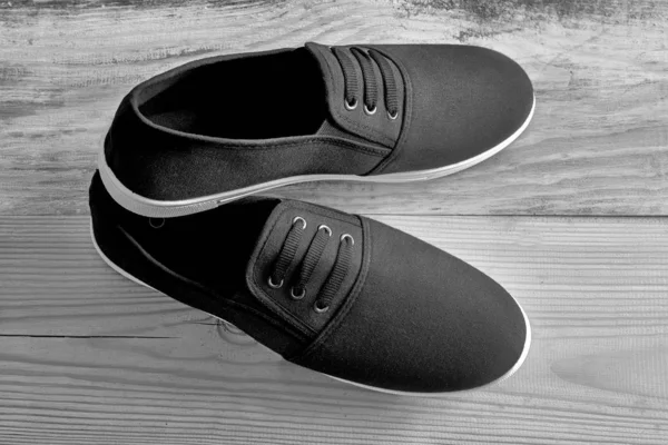 Summer sports shoes with a black cloth top. — Stock Photo, Image