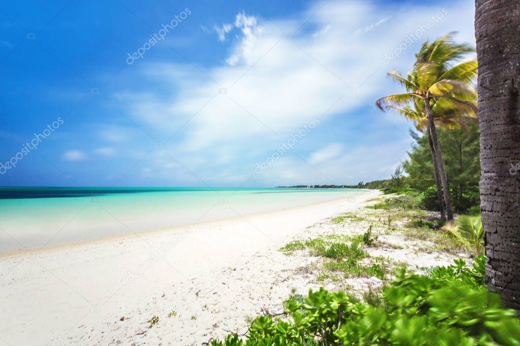 Beautiful beach in Bahamas, caribbean ocean and idyllic islands in a sunny day