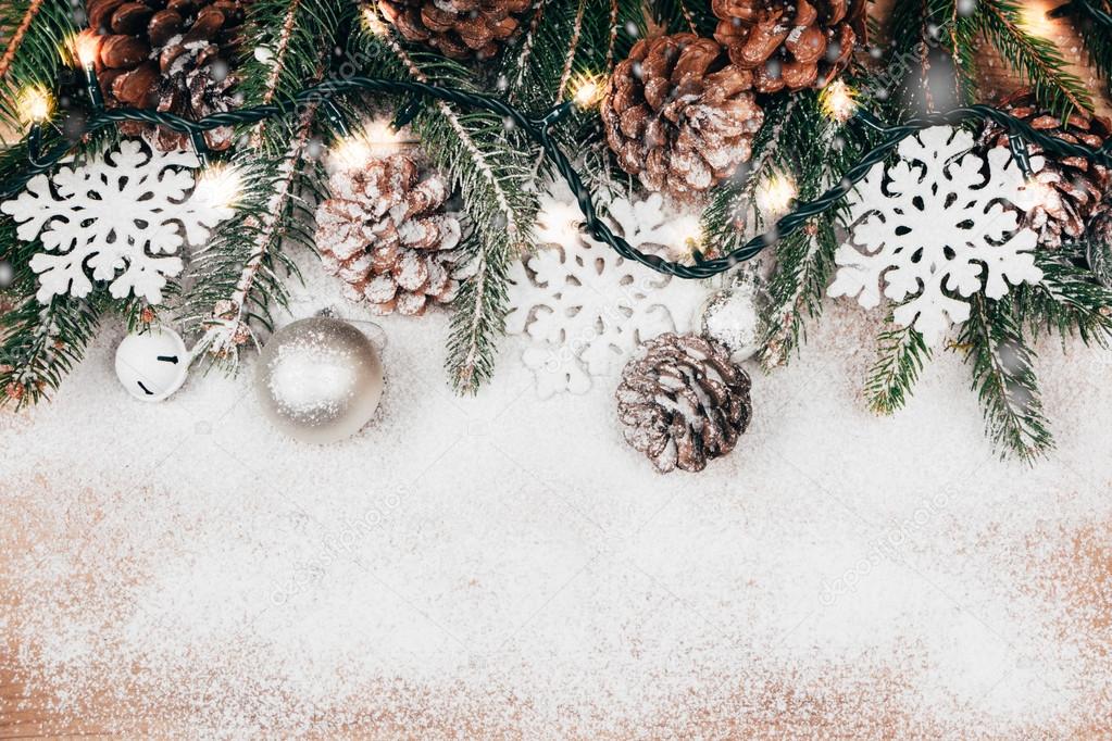 Christmas background with fir and pinecones