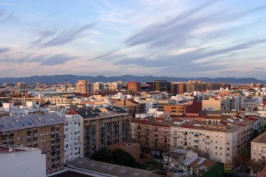 Valencia, Spain, December 2019. Beautiful city in the rays of the setting sun. View from above. Spanish travel.