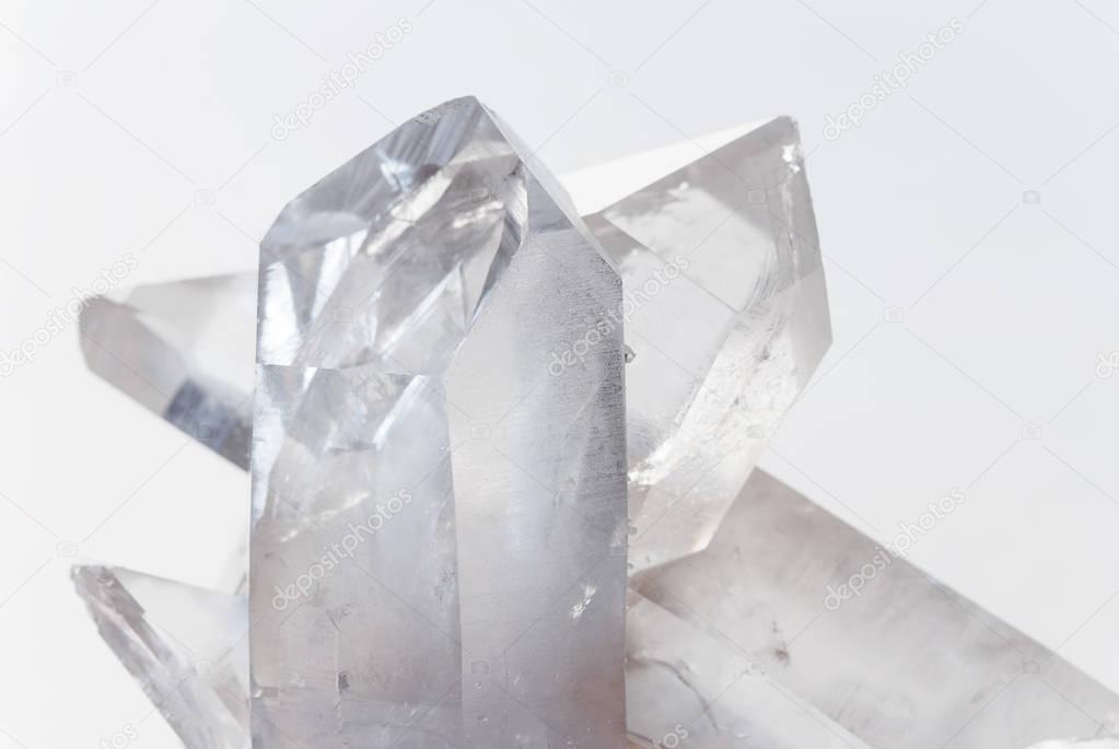 Transparent rock crystals on white