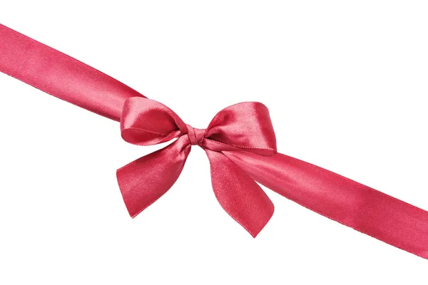 Red silk bow on the ribbon on a white background — Stock Photo, Image