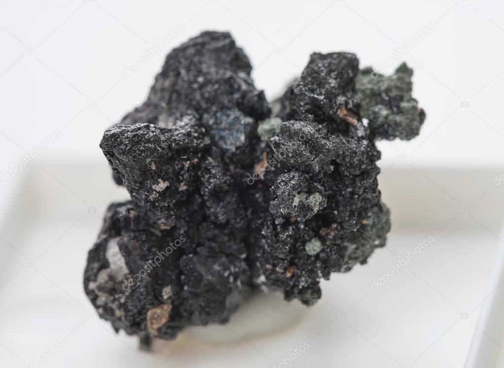 Specimen of ortite (allanite) mineral