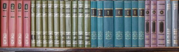 Old books on bookshelf