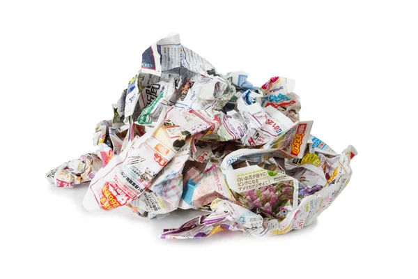 Crumpled newspapers isolated on a white — Stock Photo, Image