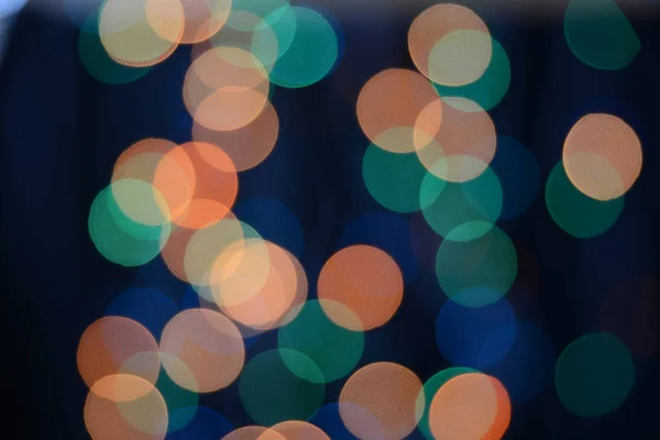 Multicolored bokeh on the black background — Stock Photo, Image