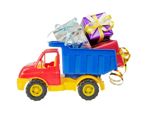 Φορτηγό παιχνίδι φέρει κουτιά δώρων — Φωτογραφία Αρχείου