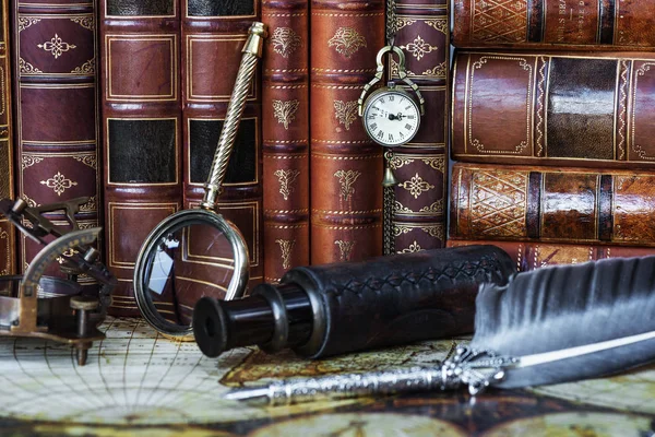 Pocket watch, silver pen and old books — Stock Photo, Image
