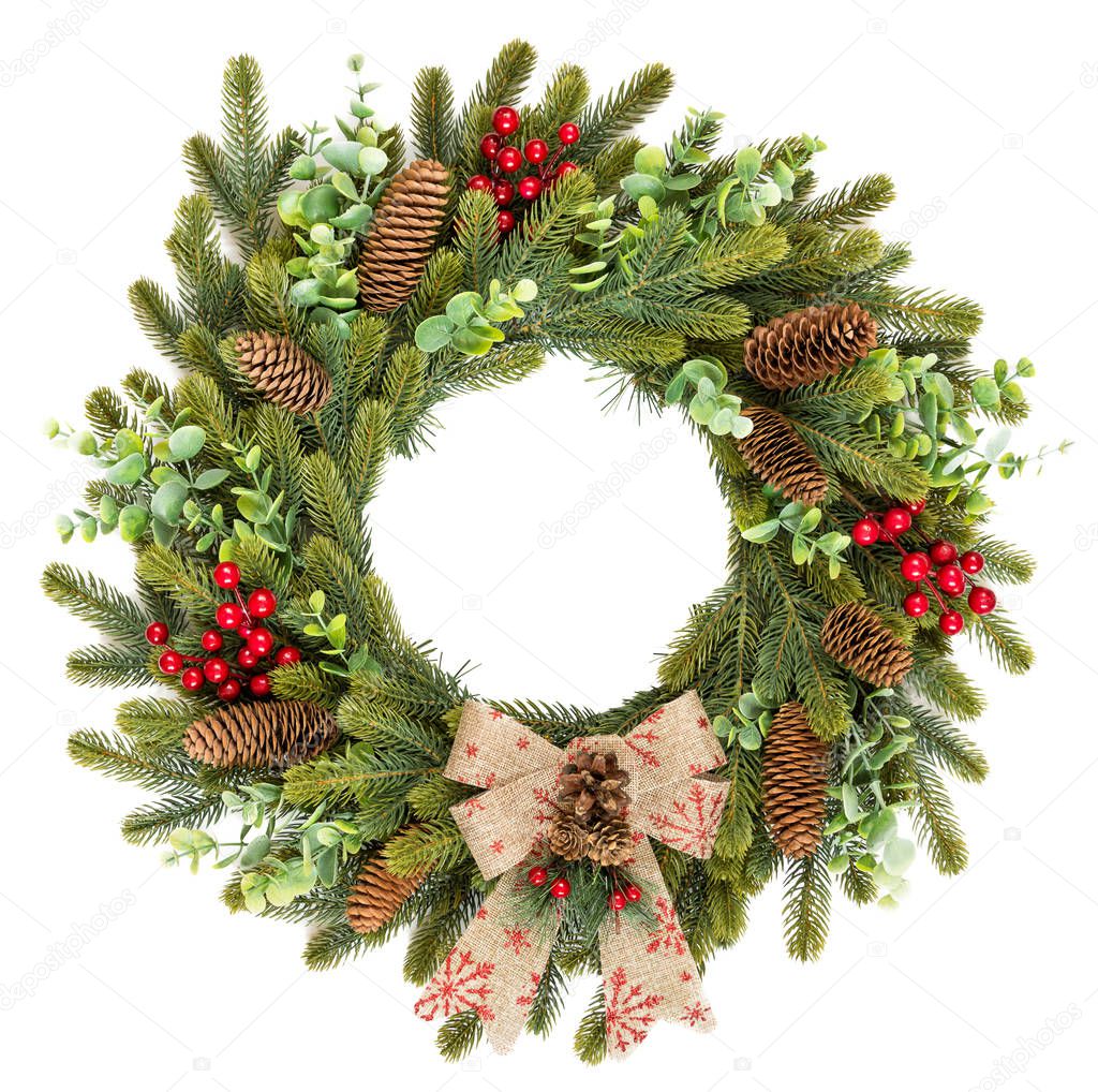 Traditional rustic Christmas wreath on white background