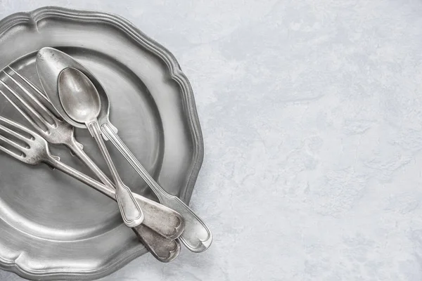 Various Flatware Pewter Plate Background Gray Concrete Surface Copy Space — Stock Photo, Image