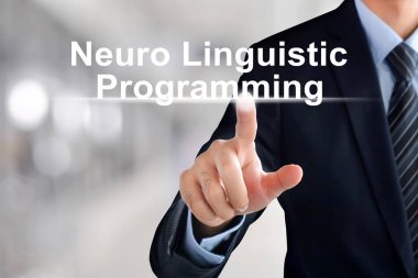 Businessman hand touching  Neuro Linguistic Programming (or NLP) clipart