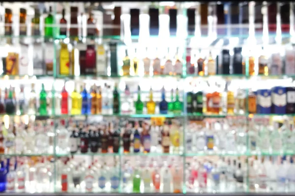Rozmycia butelki alkohol kolorowy — Zdjęcie stockowe