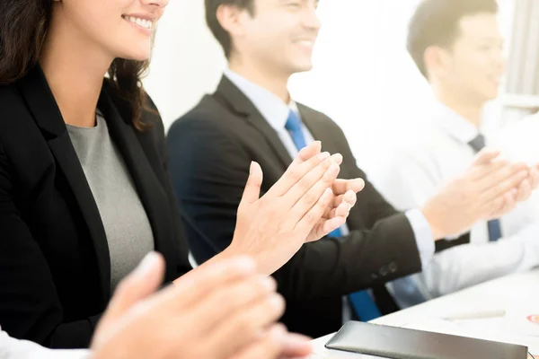 Business people  clapping their hands at the meeting — Stock Photo, Image