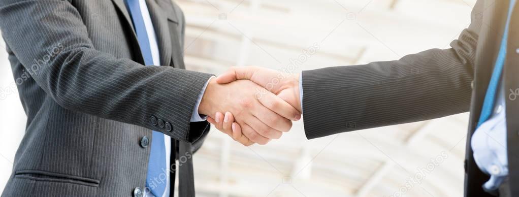 Businessmen making handshake