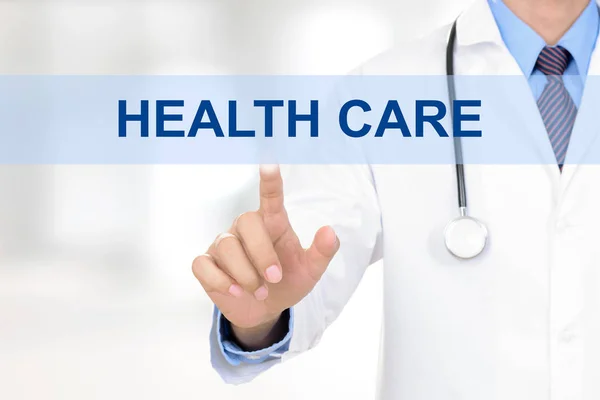 Doctor hand touching HEALTH CARE sign virtual screen — Stock Photo, Image