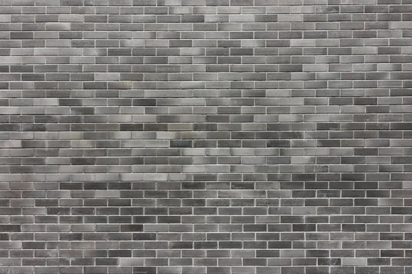 Grijze bakstenen muur textuur — Stockfoto
