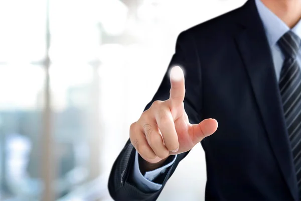 Businessman hand pointing on empty virtual screen — Stock Photo, Image