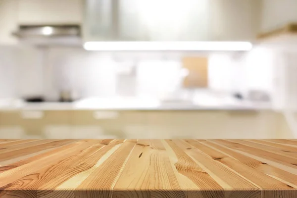 Natural Pattern Wood Table Top Or Kitchen Island On Blur Kitchen Interior Background Stock Images Page Everypixel