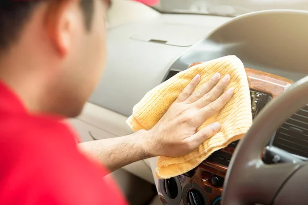 A man cleaning car interior — Stock Photo, Image