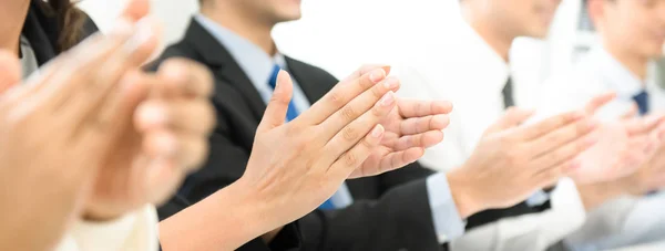 Group of business people clapping their hands at the meeting — Stock Photo, Image