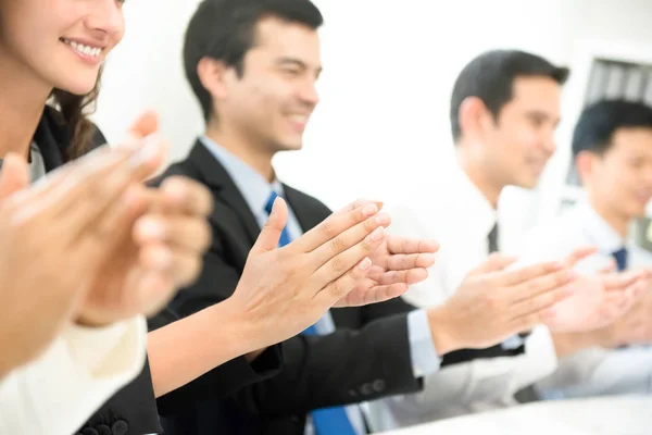 Group of business people applauding at the meeting — Stock Photo, Image