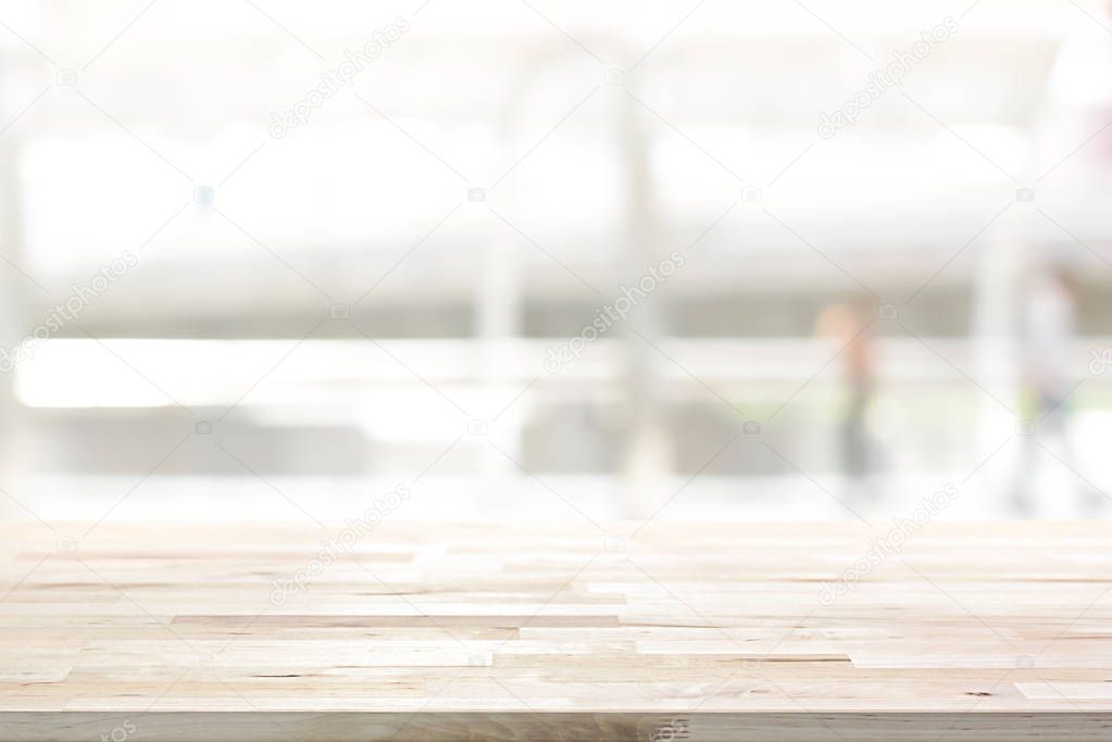Wood table top on white blur abstract background