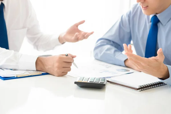 Businessmen analyzing financial documents — Stock Photo, Image