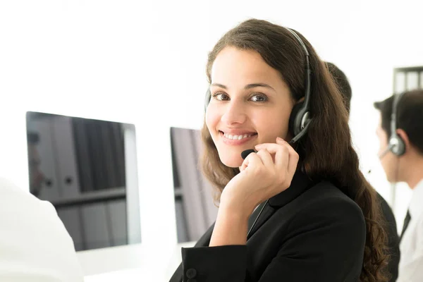 Businesswoman working in call center — Stock Photo, Image