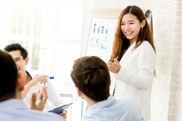 Asian businesswoman making a presentation in the meeting — Stock Photo, Image