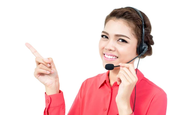 Young businesswoman wearing microphone headset as an operator — Stock Photo, Image