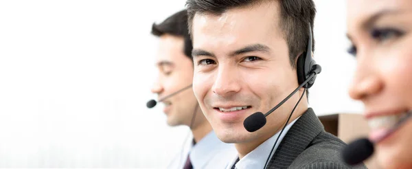 Handsome hispanic businessman working in call center — Stock Photo, Image